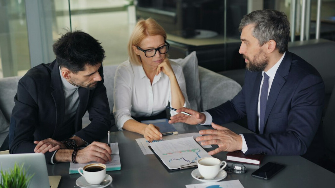 business team reviewing insurance
